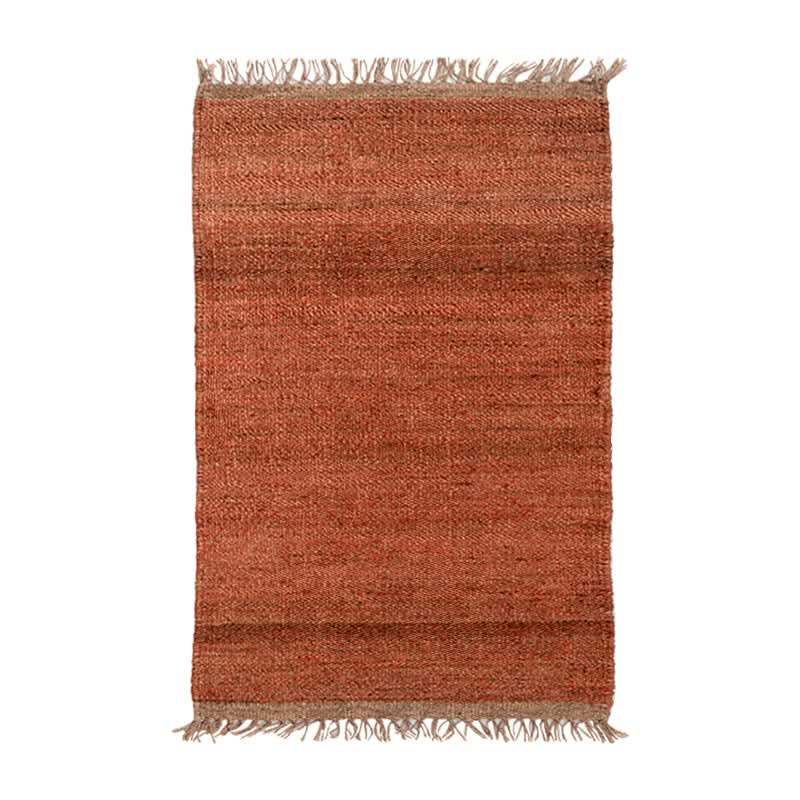 Handwoven Jute Rug - Natural & Rustic, terracotta hue, fringed edges.